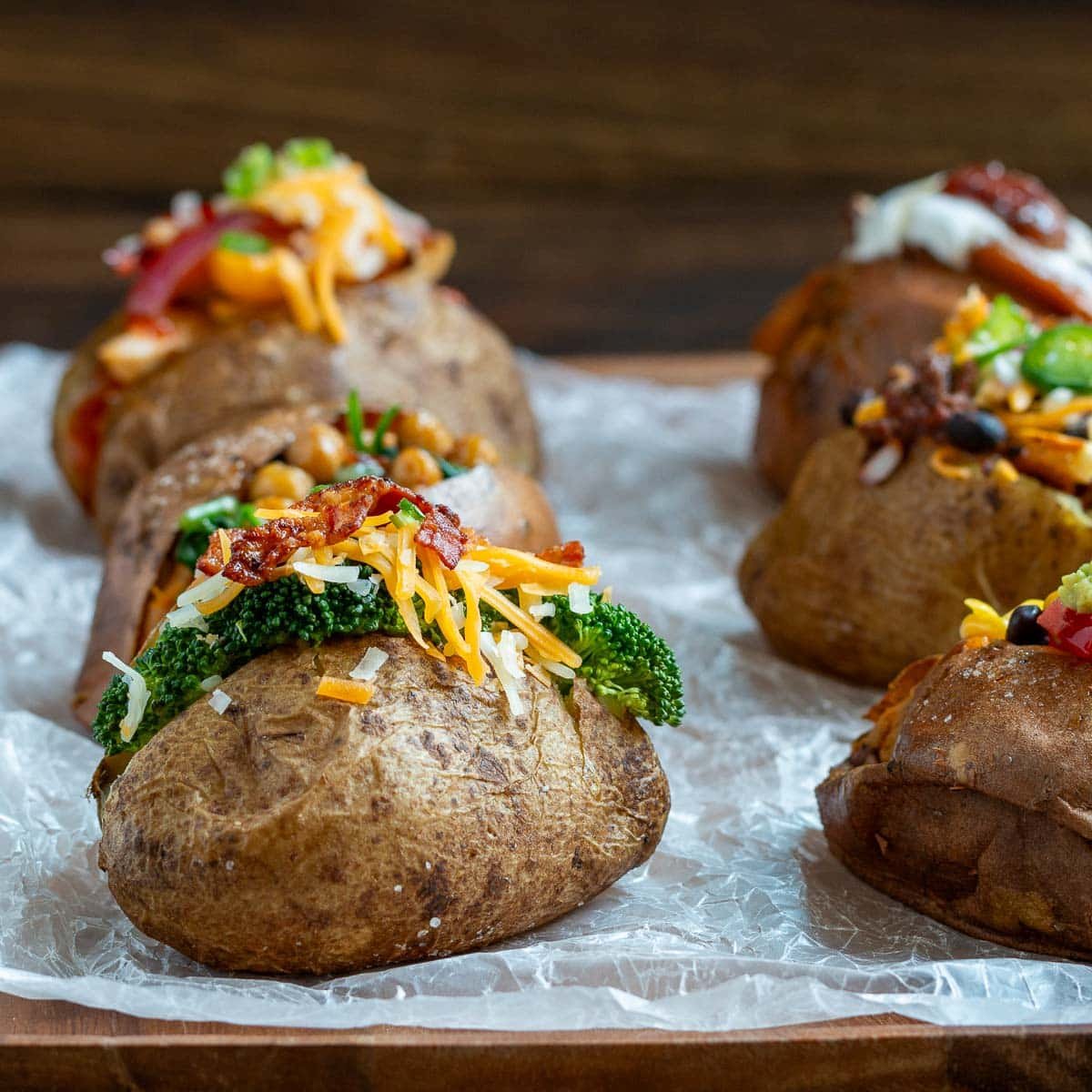 Broccoli and cheese baked potato topped with crumbly bacon. 