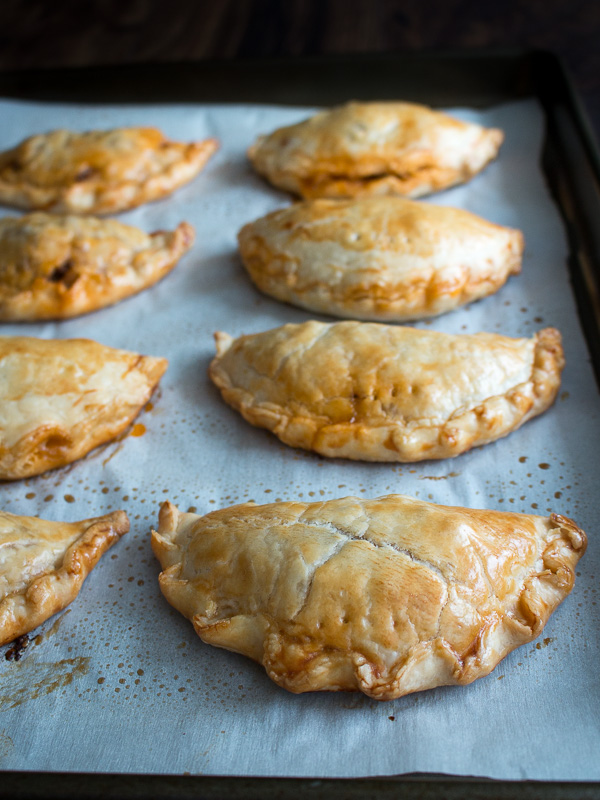 Beef Empanadas on a baking sheet.