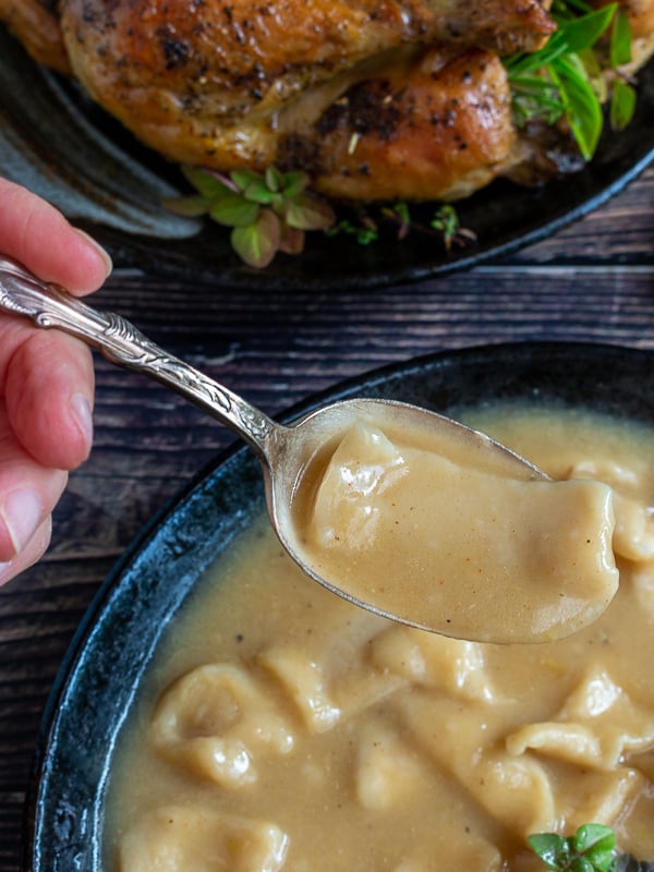 Spoonful of sliders on a silver antique spoon. 