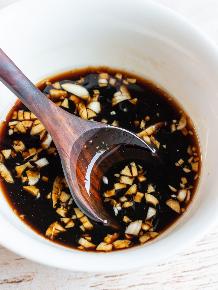 Dipping sauce in a white bowl.