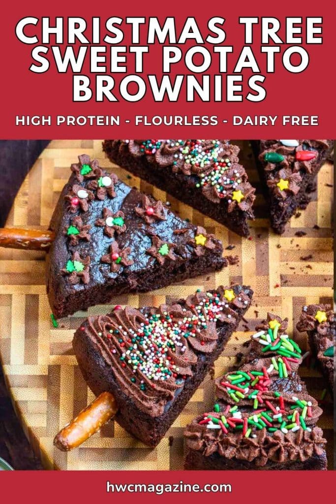Christmas tree sweet potato brownies that are high protein, flourless and dairy free on a wooden round cutting board.
