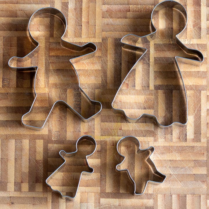 4 gingerbread men and women cookie cutters.