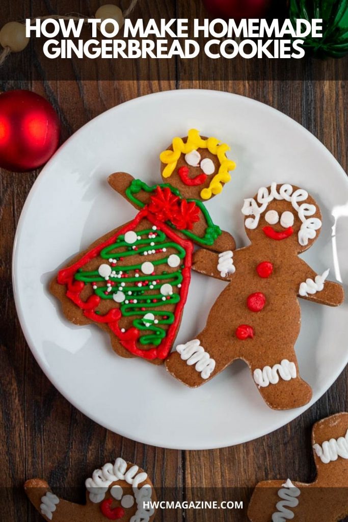 2 decorated cutout gingerbread cookies on a white plate.