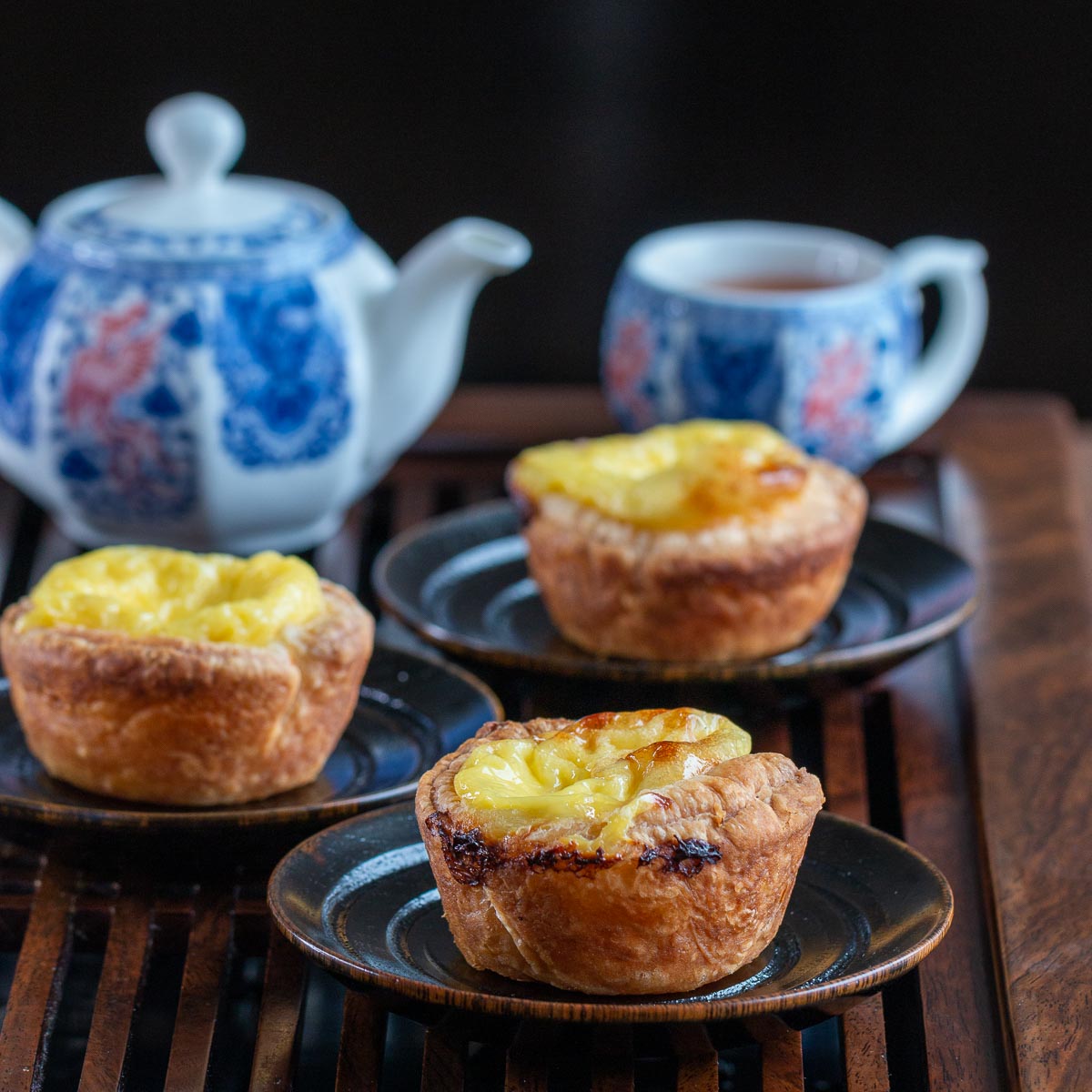 Yum Cha with Chinese egg tarts and a blue tea pot.