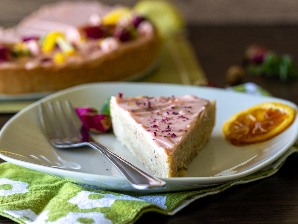 Showing the soft and chewy texture of a slice of the lemon cookie cake.