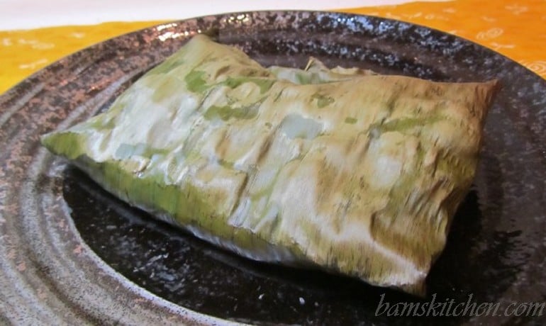 Tropical Banana Leaf wrapped coconut fish and sumans