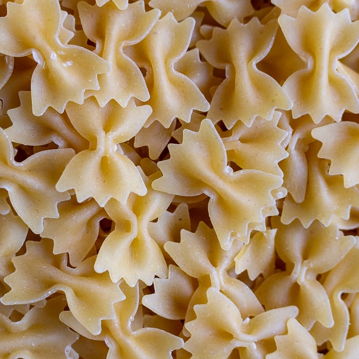 close up shot of mini dried farfalle pasta.