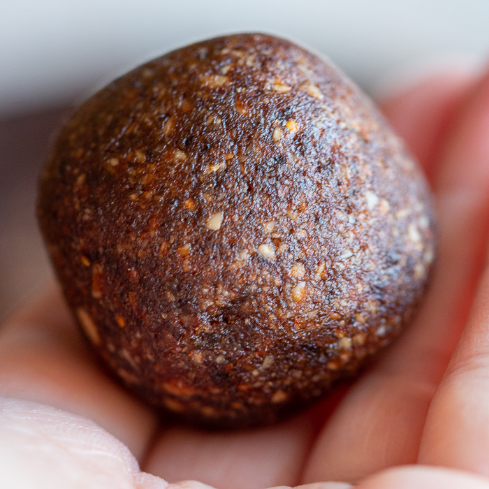 Chocolate Espresso Fig balls just rolled into a nice little ball. Held in hand. 