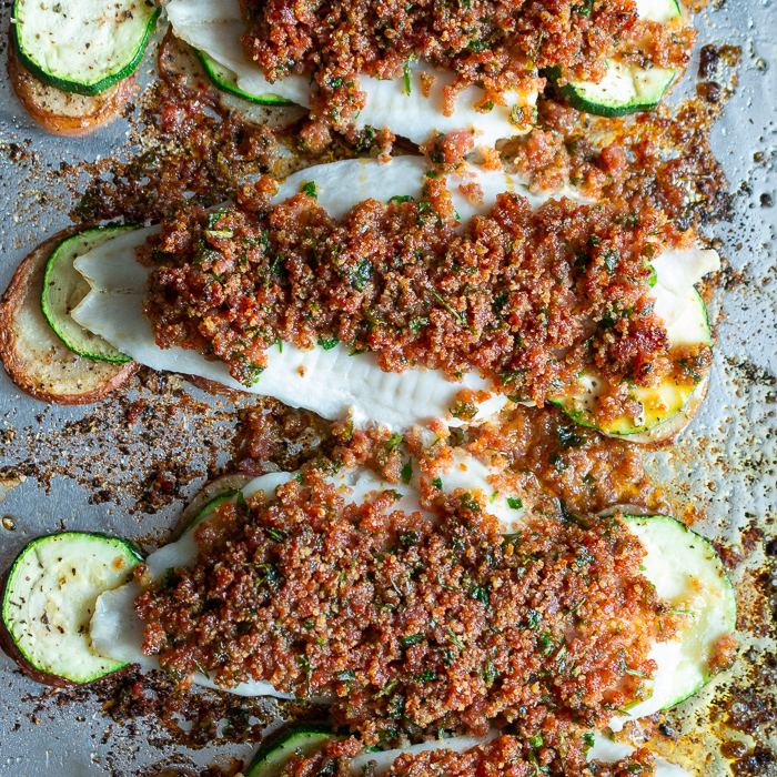 Baked Chorizo Crusted Fish and Potatoes head down shot close up. 