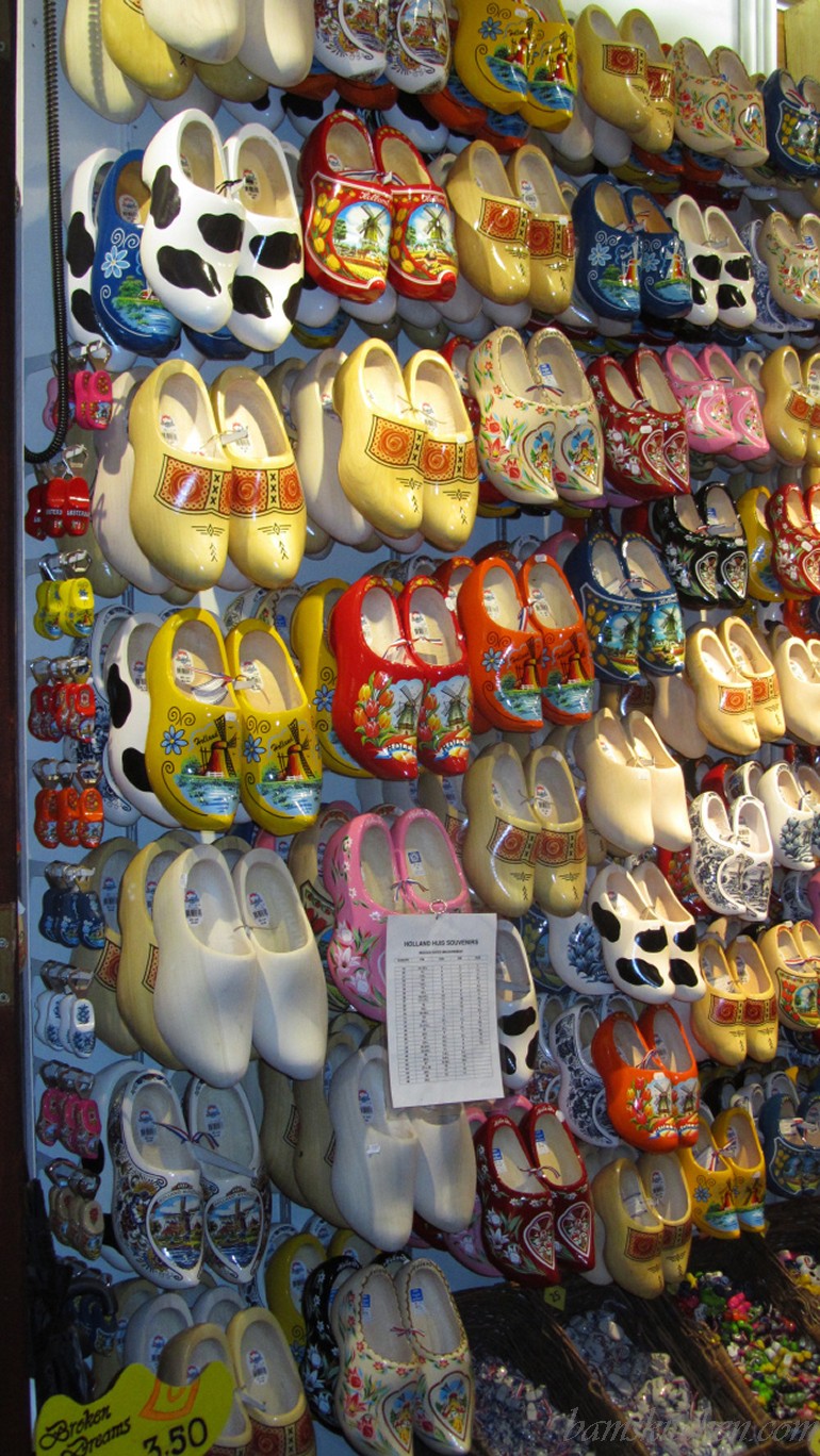 Wall of wooden clogs.