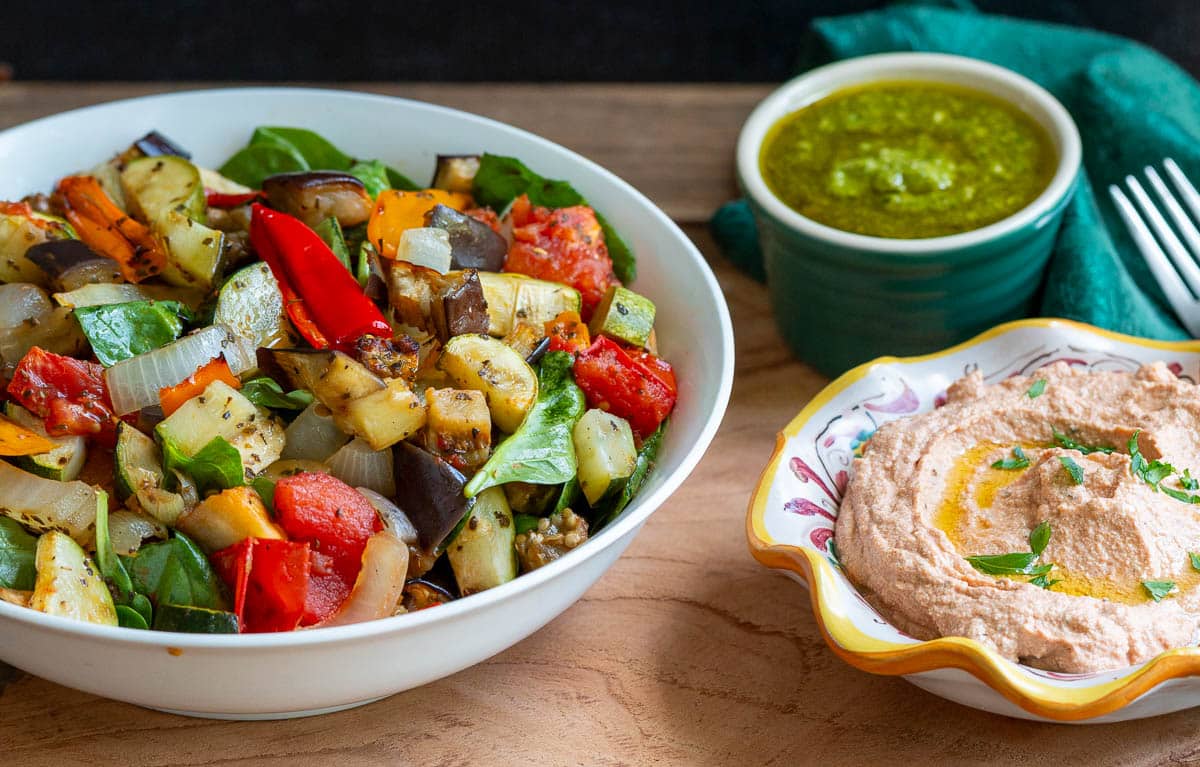 3 bowls - one with pesto, one with tofu ricotta and one with the roasted summer vegetables. 