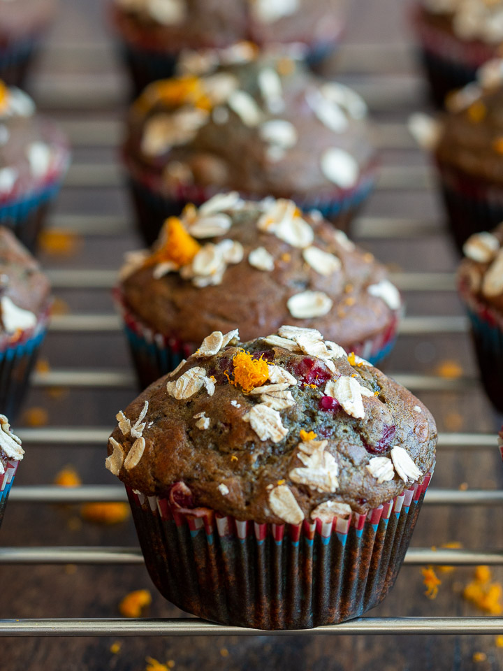 Cranberry muffins lined up in a row.