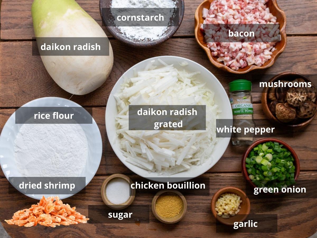 Ingredients to make daikon radish cake on a  wooden board.