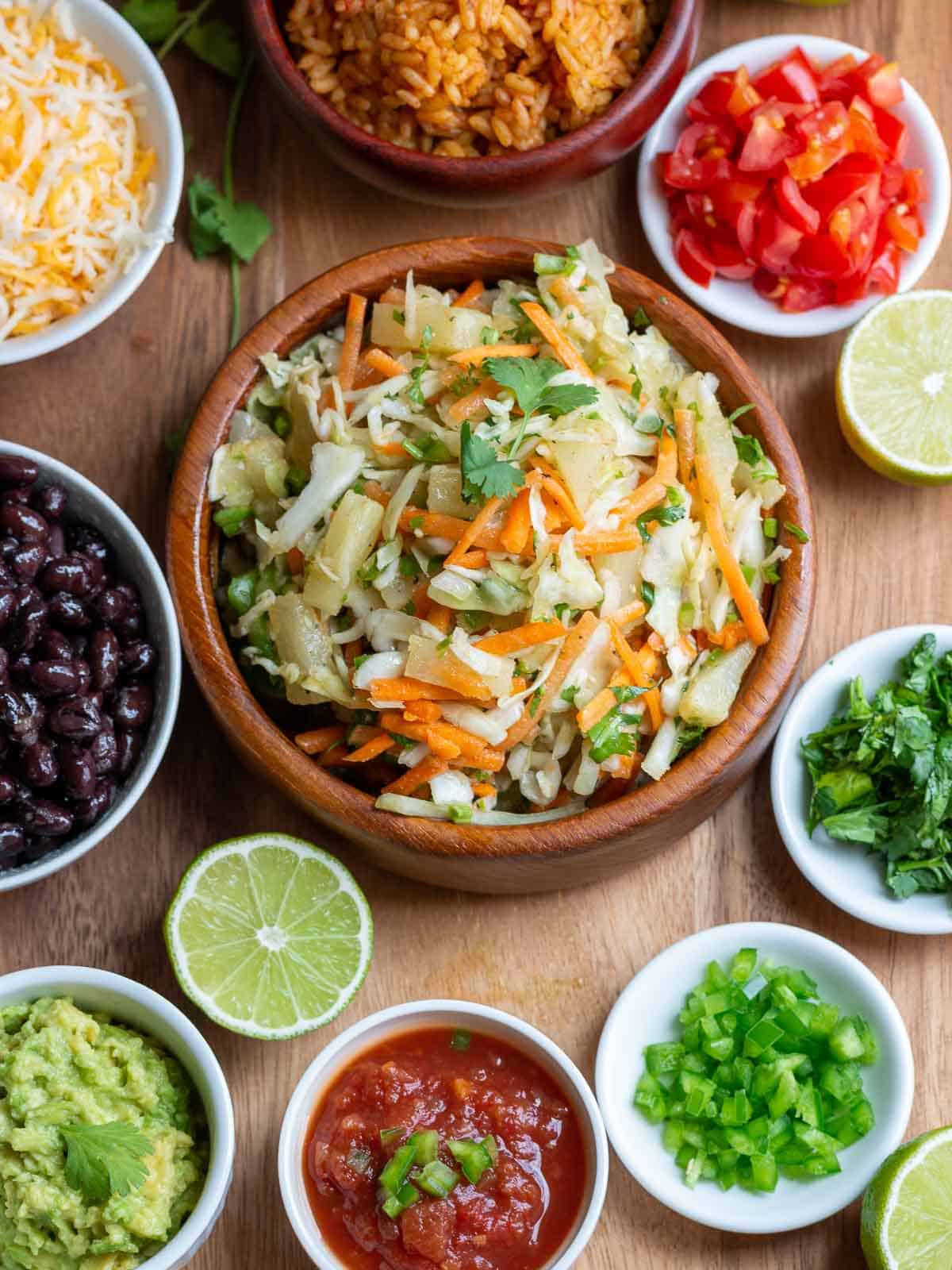 Toppings for carnitas burritos.