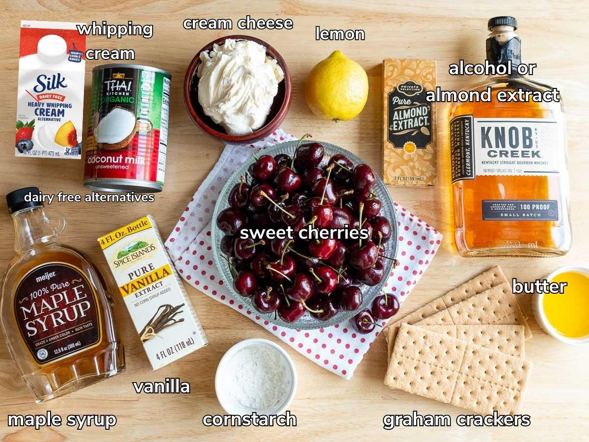 Ingredients to make boozy cherry cheesecake cups with vegan alternatives.
