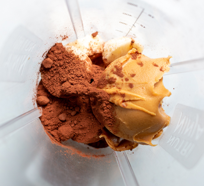 Chopped frozen bananas, unsweetened cocoa powder, and nut butter of choice in your blender. 