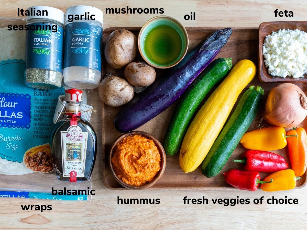 Suggested ingredients to make vegetarian wraps with hummus.