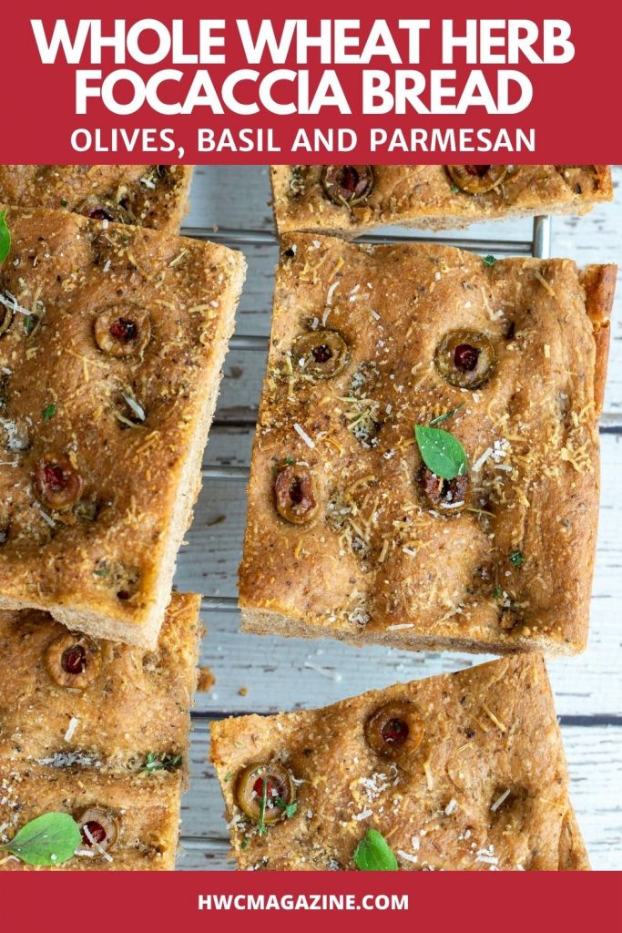 Cut wheat focaccia bread cooling on a wire rack.