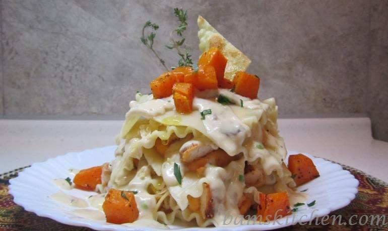 Topless Butternut Ravioli with Sauteed chicken and a creamy wild mushroom sauce 