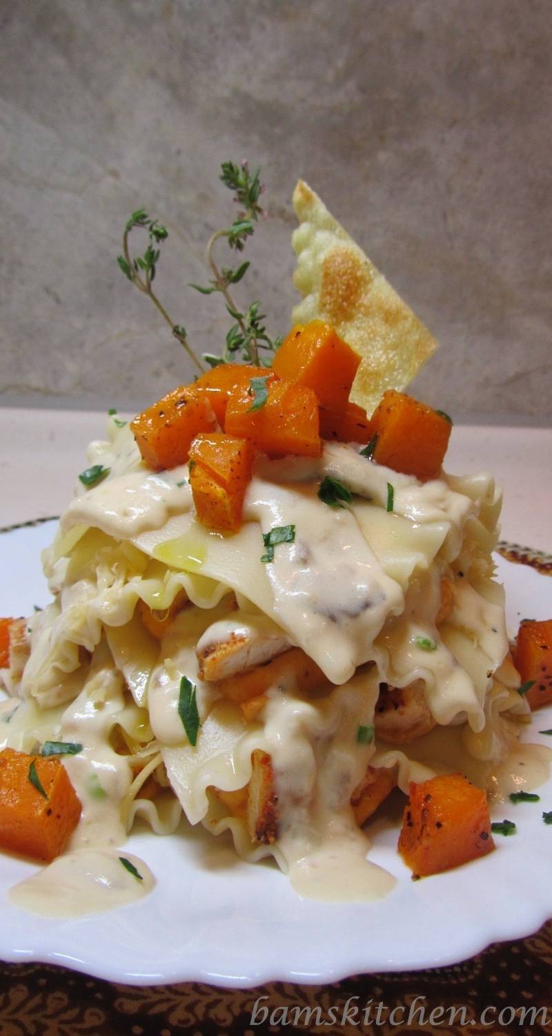 Topless Butternut Ravioli with Sauteed chicken and a creamy wild mushroom sauce 