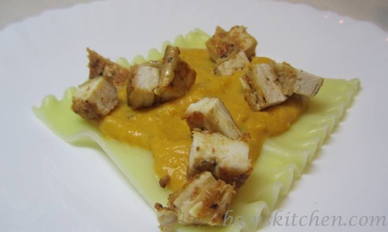 Topless Butternut Ravioli with Sauteed chicken and a creamy wild mushroom sauce 