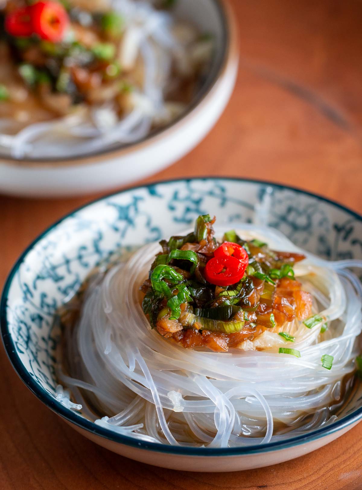 Steamed scallops in cute little blue and white dishes.