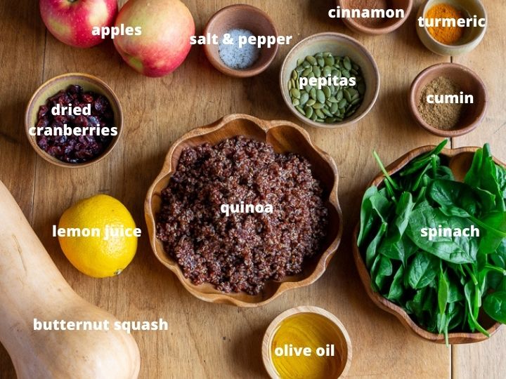 Ingredients to make the salad on a wooden table.