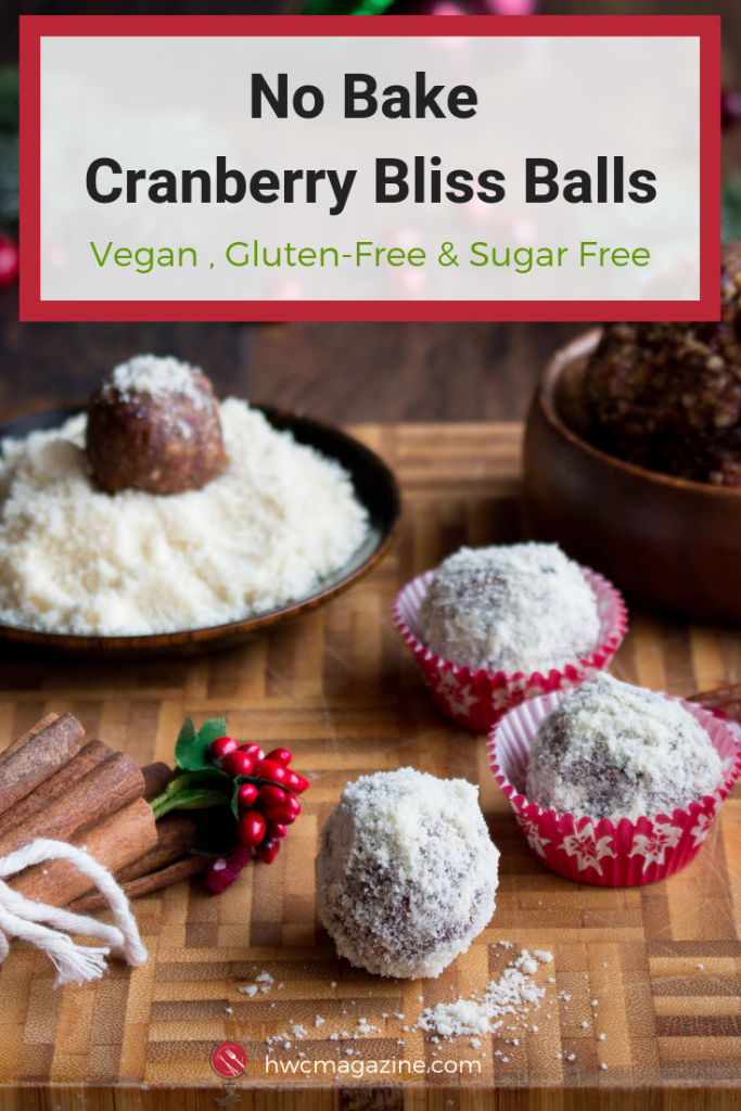No Bake Cranberry Bliss Balls are a healthy grab and go snack filled with dates, nuts, cranberries and Holiday Spices. Deliciously Vegan, Gluten-Free, Sugar Free and take only 20 minutes. #vegan #glutenfree #dairyfree #healthy #snack #dessert #cookie #holiday #nobake #sugarfree #cranberries #healthysnacks #plantbased / https://www.hwcmagazine.com