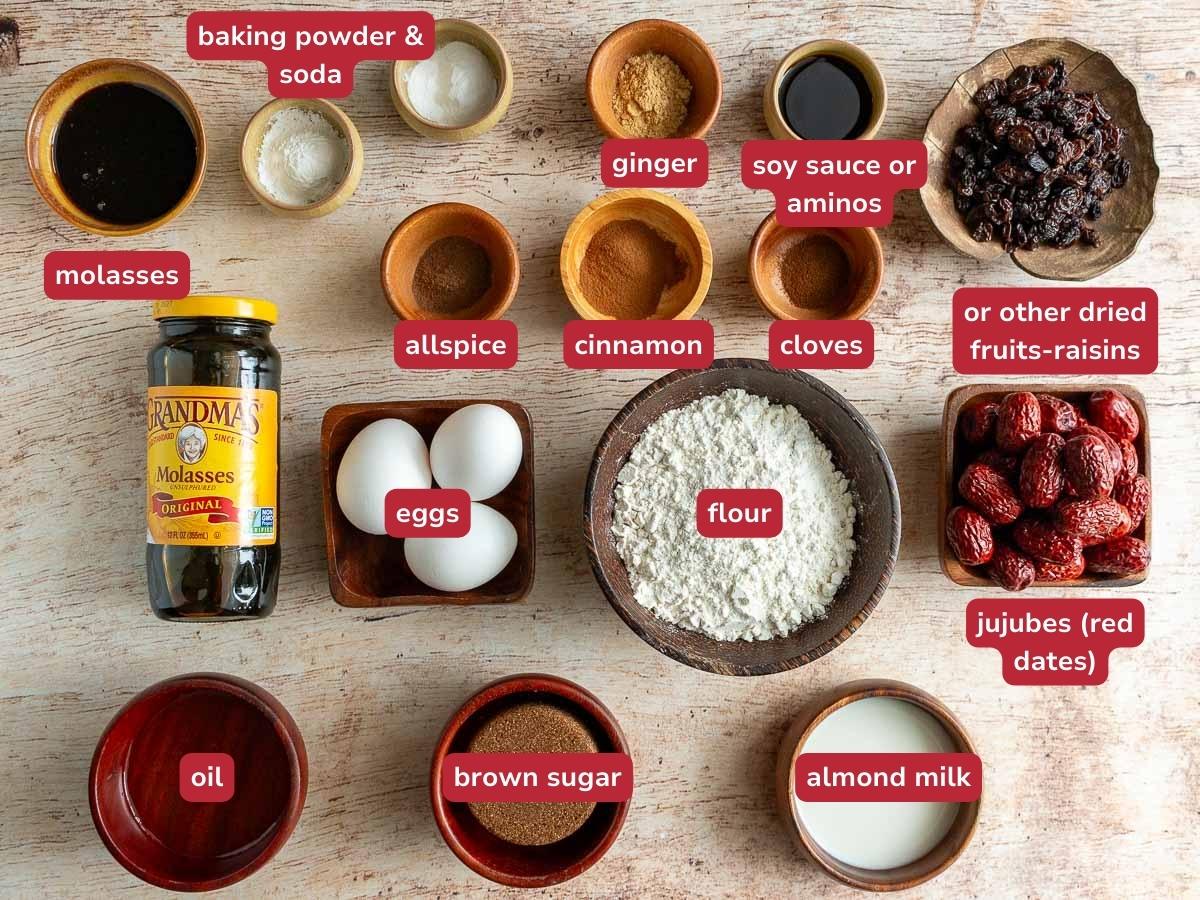 Ingredients to make a holiday steamed bread laid out on a wooden table. 