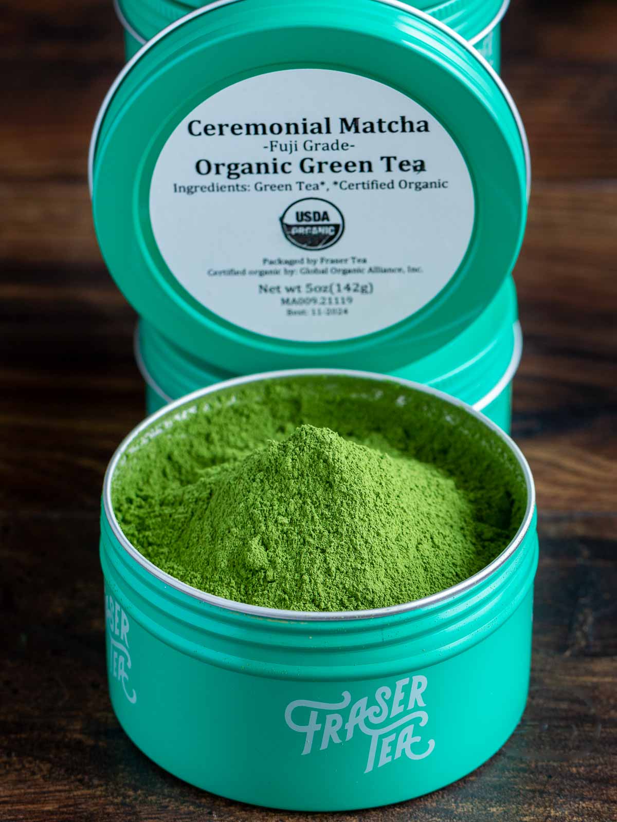 Fraser Tea Ceremonial Matcha Organic Green Tea in a canister with the lid off. 