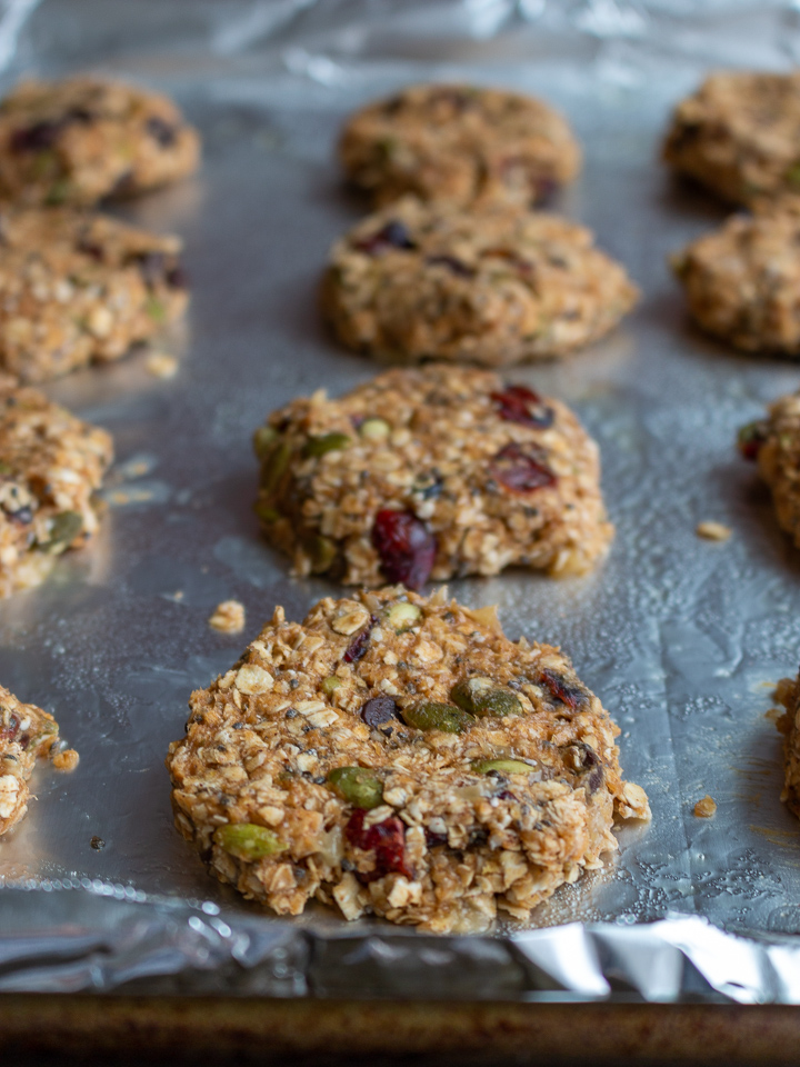 Breakfast cookies on a baking tray ready to go into the oven. 