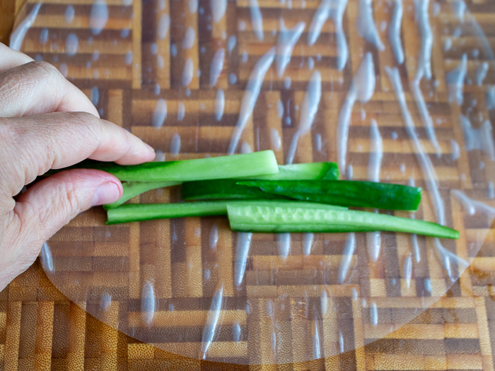 cucumbers on the moistened rice wrapper. 