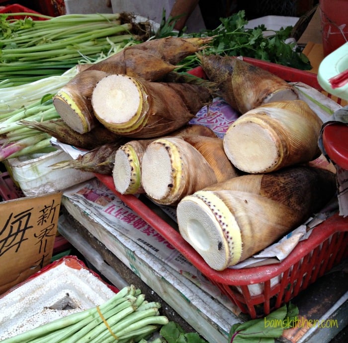 Fresh bamboo shoots with the peel on displayed in the Central wet market in Hong Kong