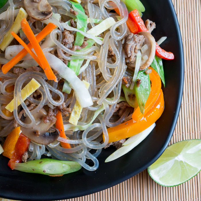 Camote Bihon Sweet Potato Noodles on a black plate.