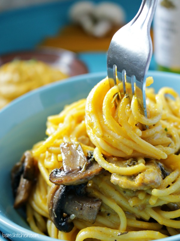 Vegan Kabocha Truffle Pasta in a blue bowl.