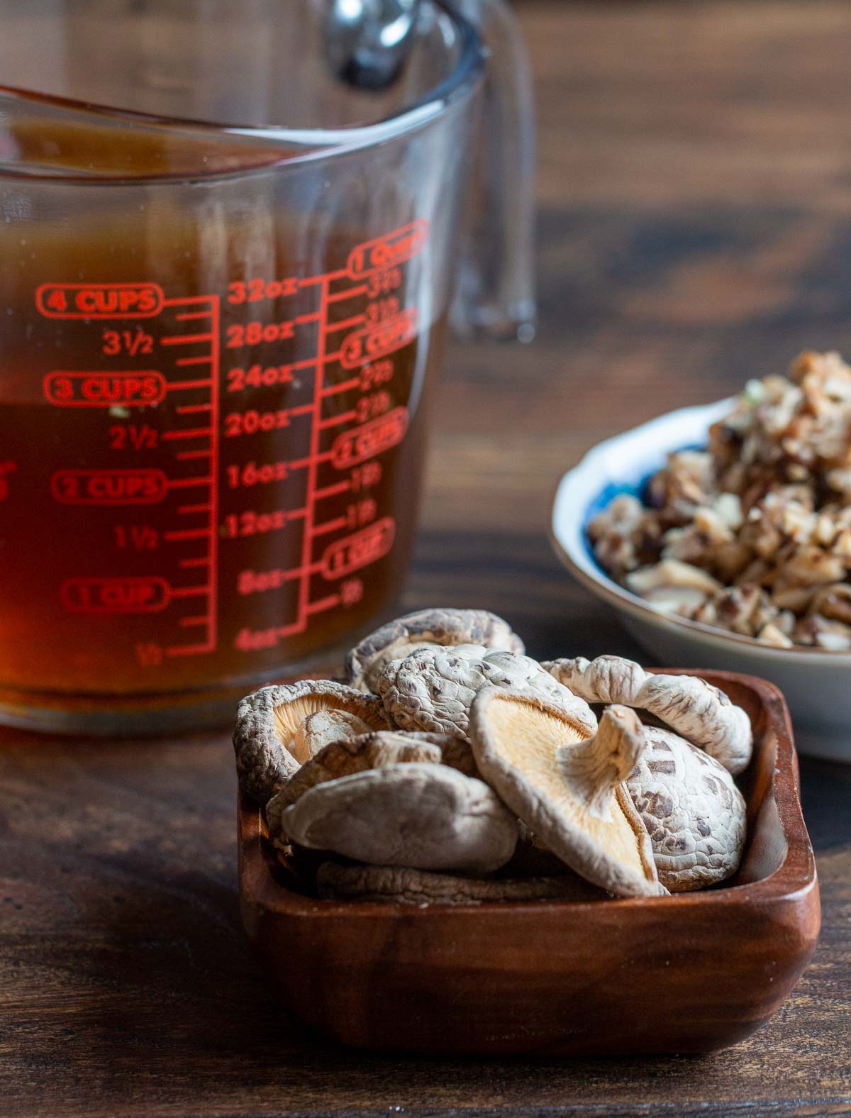 Dried shiitake mushrooms, mushrooms that have been soaked and chopped and the mushroom broth.