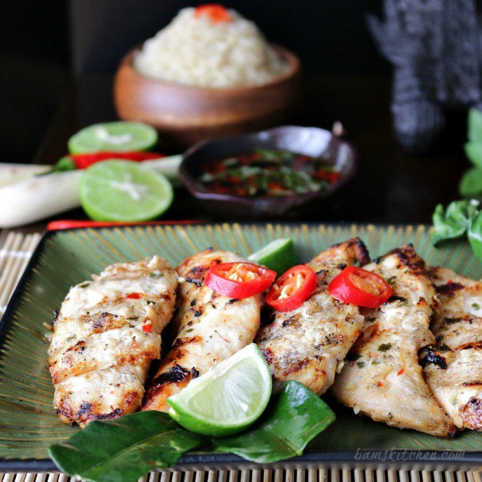 Thai Grilled Chicken Tenderloins on a green plate.