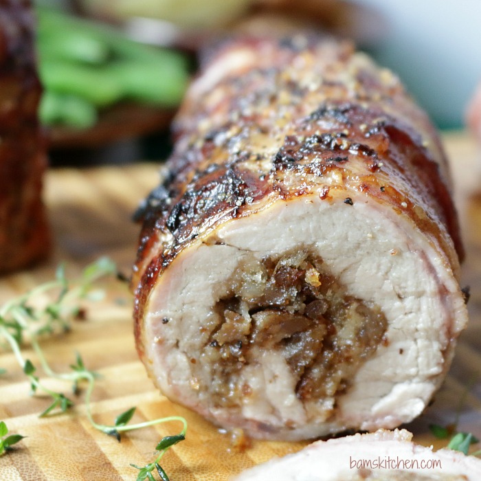 Bacon Wrapped Sausage Stuffed Pork / https://www.hwcmagazine.com