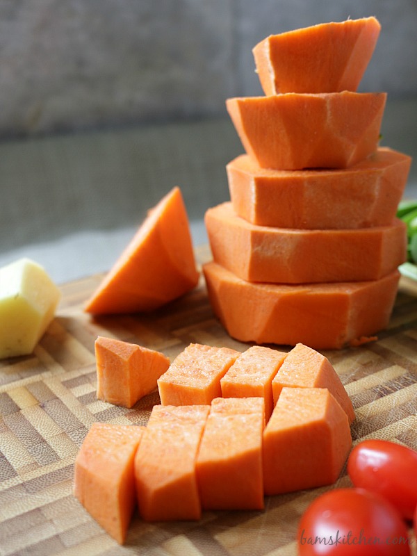 Sweet Potatoes slices stacked high.