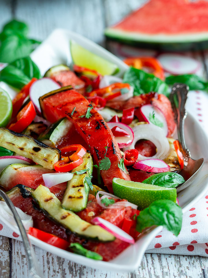 Summer salad with watermelon and lots of fresh crisp veggies.