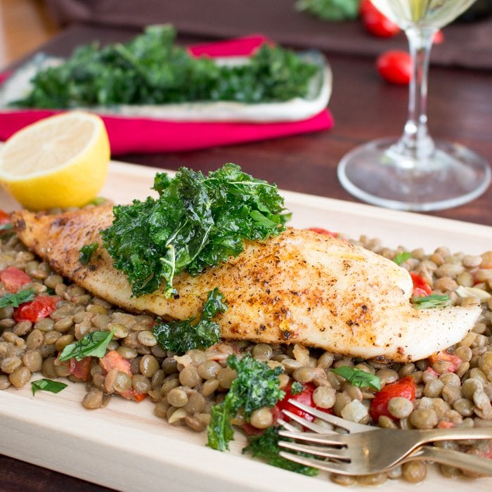 Baked Tilapia with Caramelized Onion Lentils / https://www.hwcmagazine.com