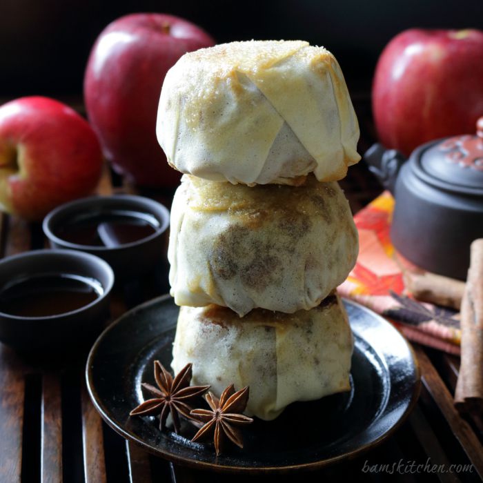 Apple Pecan Mooncake in a stack of 3 with star anise and tea.