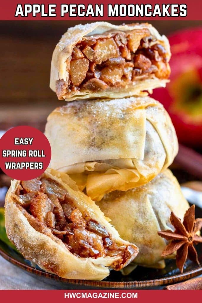 Apple pecan mooncakes piled high with one cut in half showing the delicious filling.
