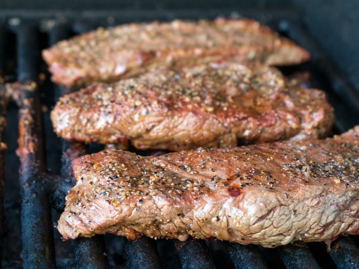Flank steaks on the grill. 