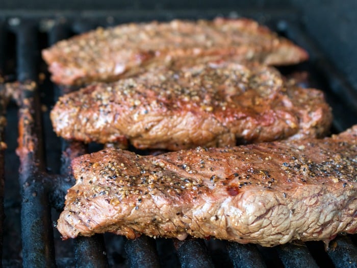 Grilled Flanks Steaks with thai Style Chimichurri / https://www.hwcmagazine.com