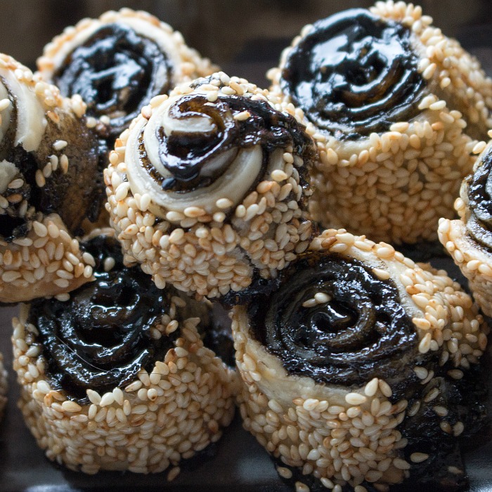 Sesame Spiral Pie Cookies freshly baked out of the oven garnished with white sesame seeds.