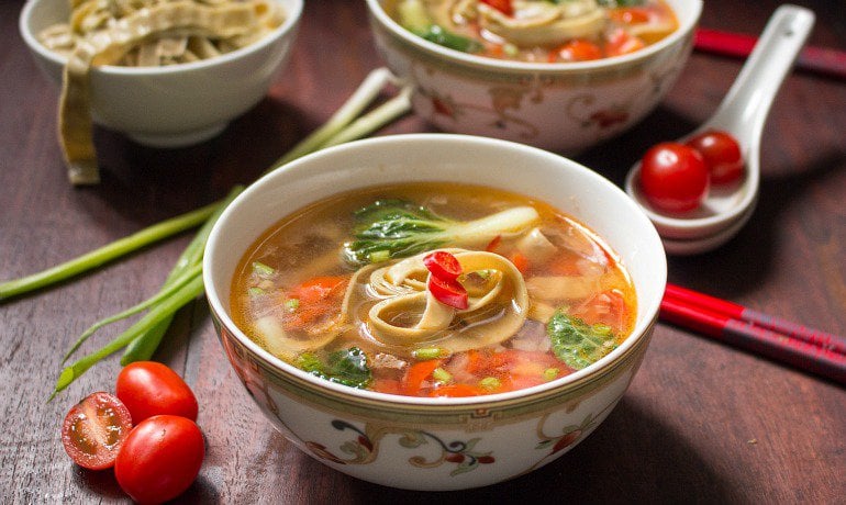 Spicy Tomato Mung Bean Noodle Soup / https://www.hwcmagazine.com