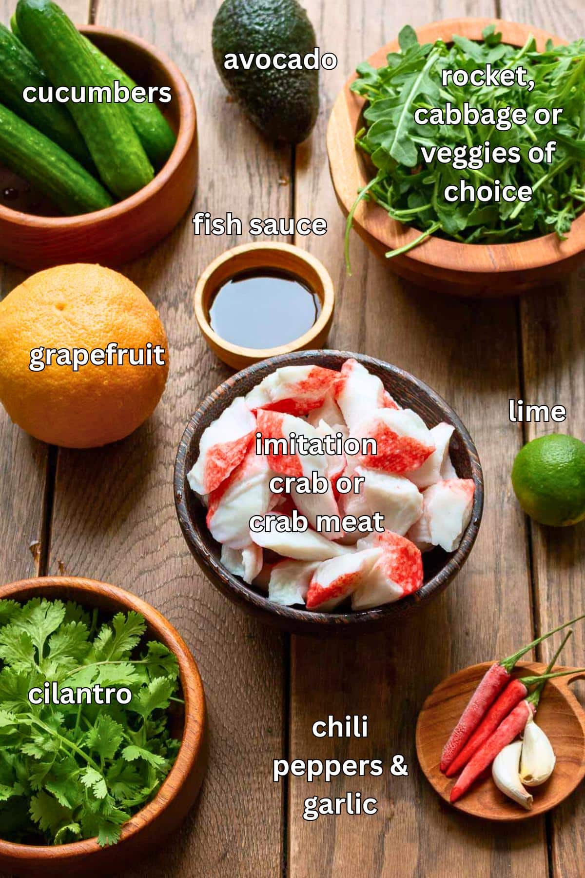Ingredients to make a quick and easy Thai seafood salad on a wooden board.