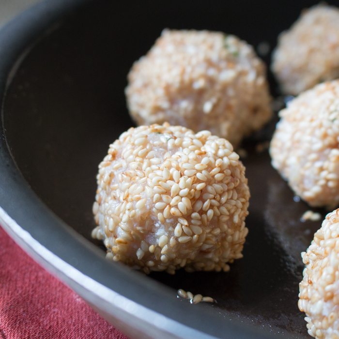 Chicken balls rolled in sesame seeds.