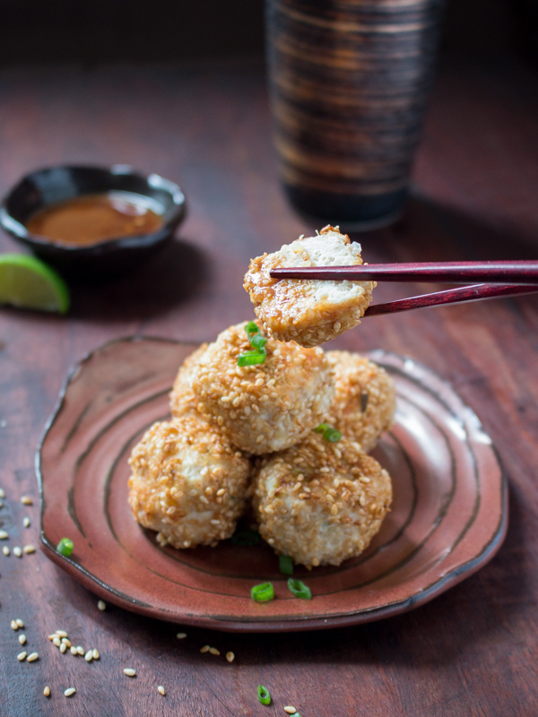 The bite shot. A bite of chicken meatball dipped into pozu sauce.